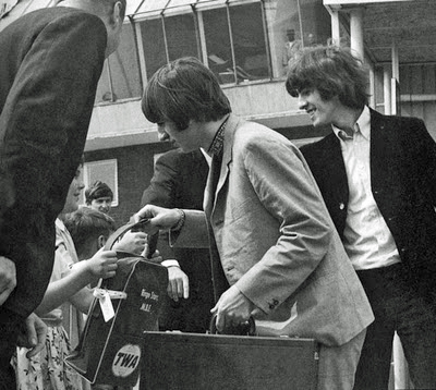 Ringo with TWA flight bag.